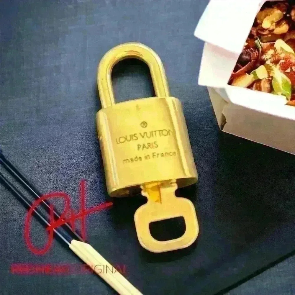 Louis Vuitton lock and key- 300 series number I have 12 different #s comes bag